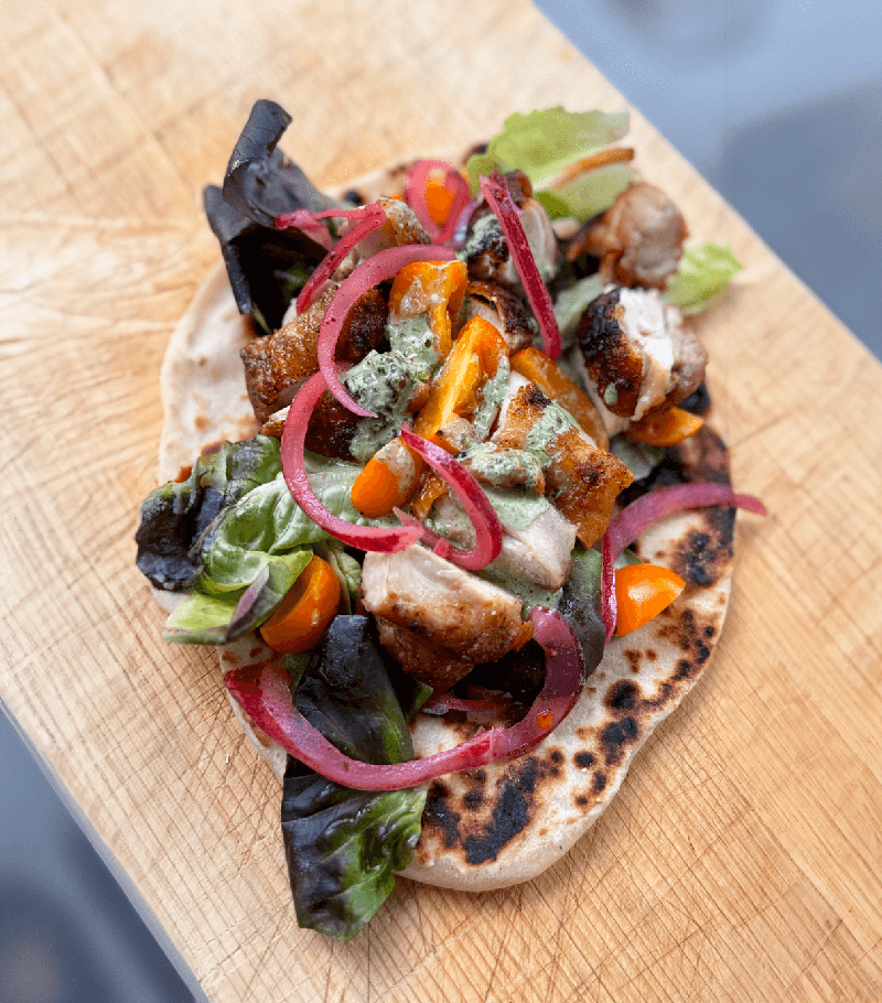 Crispy Chicken Turkish Flatbread with Cilantro Yogurt Sauce and Pickled Onions - Photos and recipe: Dave Sands Firecracker Farm Recipe Image